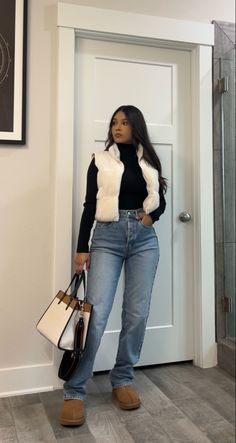 Wide leg jeans, black turtle neck lomg sleeve, sherpa puffer vest, coach color block tote bag #outfitideas #casualstyle #fallfashion #petitestyle White Vest Outfits For Women Winter, Puffer Vest Outfits For Women Fall, Black Boots And Jeans Outfit, Fall Outfits Curvy, Turtle Neck Outfits, College Fall Outfits, Chicago Fall, Sporty Mom, Uni Fits