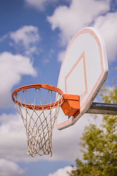 Low angle of basketball ring hanging on backboard against plants growing on sports court Basketball Court Pictures, Ring Basketball, Athlete Training, Basketball Ring, Sports Court, Filipino Art, Plants Growing, Sport Court, Low Angle