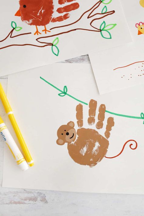 10 Handprint Animal Crafts That Kids Will Love! - Childhood Magic Handprint Animal Crafts, Handprint Animals For Kids, Animal Handprint Art, Grandma Handprint Gift, Handprint Animals, Hand Print Animals, Zoo Crafts, Zoo Animal Crafts, Zoo Art