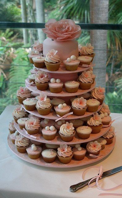 Wedding Cupcakes | Perfect Vow Renewal Cake | PreOwned Wedding Dresses Vow Renewal Cake, Cupcake Torte, Wedding Cupcake Tower, Tiny Cake, Cupcake Tower Wedding, Cake Tower, Tiny Cakes, Cupcake Display, Amazing Wedding Cakes