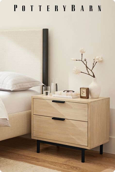 Elevate a minimalist look with quality pieces crafted to last. Complement light wood washes with warm textural elements like a woven rug and upholstered bed. Complete the look by pairing pops of black that ground the space for a modern feel. Black And Light Wood Nightstand, Light Brown Wood Furniture, Nightstand Light Wood, Black And Wood Nightstand, Light Brown Bed Frame, Dresser And Night Stand Ideas, Light Oak Bedroom, Night Stand Ideas, Side Table Wood Modern