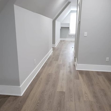 Beautiful Grey Luxury Vinyl Planks. Completely waterproof floors, scratch resistant, fade resistant, that will last you up to a lifetime! Grey Walls With Light Wood Floors, Vinyl Flooring And Wall Color, Flooring With Gray Walls, Floors With Grey Walls, Flooring With Grey Walls, Grey Walls White Trim, Light Grey Flooring, Luxury Vinyl Planks, Painted Wood Floors