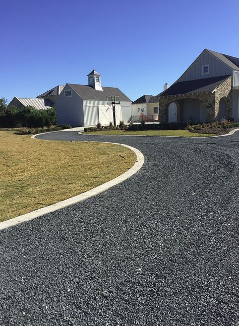 black gravel driveway Black Asphalt Driveway, Light Gravel Driveway, Front Yard Gravel Driveway, Rock Driveway Edging, Black Rock Driveway, Crushed Asphalt Driveway Ideas, Dark Gravel Driveway, Long Gravel Driveway Landscaping, Alternative Driveway Ideas