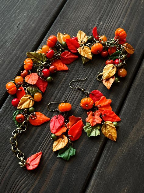 Clay autumn bracelet earrings set, handmade pumpkin winter berry fall leaves ashberry rowan autumn thanksgiving bracelet unique fall gift by NanaSunsCreations on Etsy Autumn Jewelry Aesthetic, Thanksgiving Clay Ideas, Thanksgiving Bracelet, Polymer Figures, Polymer Clay Leaves, Clay Autumn, Fall Clay Earrings, Woodcarving Ideas, Winter Berry