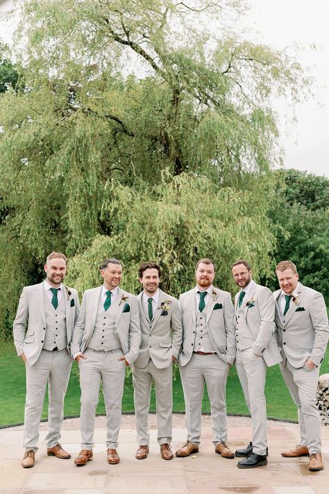 Groomsmen and groom in matching bespoke light grey suit with green ties and handkerchiefs Suits With Green Ties, Wedding Entourage Dress, Groomsmen Attire Grey, Groomsmen Colours, Light Grey Suit, Gray Groomsmen Suits, Wedding Party Groomsmen, Green Ties, Outdoor Styling