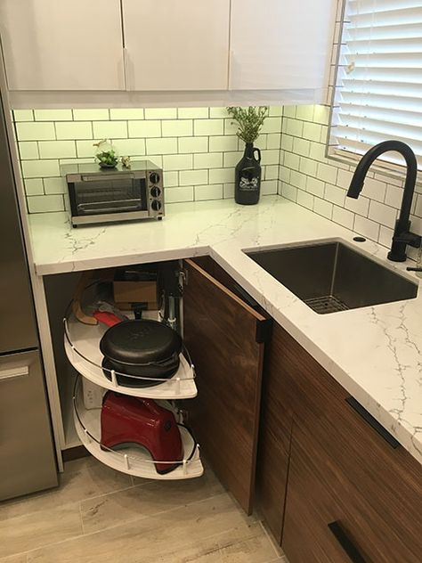 An IKEA UTRUSTA pull-out carousel expands space in this small kitchen Ikea Utrusta Pull Out, Ikea Kitchen Corner, Ikea Corner Kitchen Cabinet, Utrusta Ikea, Ikea Corner Cabinet, Diy Kitchen Storage Cabinet, Blind Corner Cabinet Solutions, Ikea Kitchen Sink, Kitchen Corner Ideas