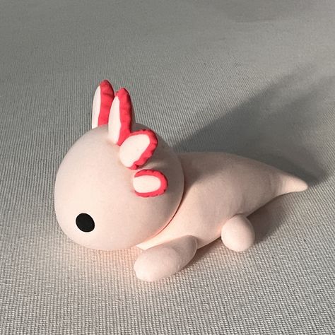 This is made by soft clay. Visit my Samdwich channel on youtube Clay Crafts Axolotl, Air Dry Clay Axolotl, Modeling Clay Ideas Step By Step, Soft Clay Crafts, Super Light Clay Ideas, Polymer Clay Axolotl, Soft Clay Ideas, Axolotl Clay, Soft Clay Art