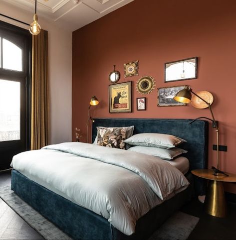 Terracotta And Blue Bedroom Ideas, Rust Feature Wall Bedroom, Deep Orange Bedroom, Terracotta Teal Bedroom, Orange Victorian Bedroom, Light Blue And Terracotta Bedroom, Dark Blue And Orange Bedroom, Warm Eclectic Bedroom, Blue Terracotta Bedroom