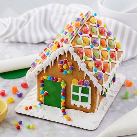 Christmas Activities | Holiday Fun | Gingerbread House No holiday is complete without building a gingerbread house with those you love dear! This kit provides everything you need to create a one of a kind masterpiece! Get yours today! #ad #christmas #fun #holiday #gingerbreadhouse #christmascheer #christmasspirit #holidayfun #winter #winteractivity #activity #kids #rainbow Village Gingerbread House, Homemade Gingerbread House, Mini Village, Gingerbread House Decorating, Gingerbread House Candy, Mini Gingerbread House, Gingerbread House Christmas, Gum Drop, Gingerbread House Designs