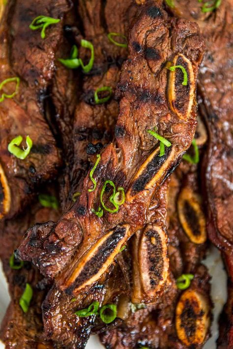 Korean Short Ribs, are cut Flanken-style, marinated in a sweet and savory Kalbi marinade for hours, then grilled to tender, juicy perfection. Short Rib Marinade, Rib Marinade Recipe, Ribs Marinade Recipe, Korean Marinade, Flanken Ribs, Guam Recipes, Rib Marinade, Korean Short Ribs, Asian Pears