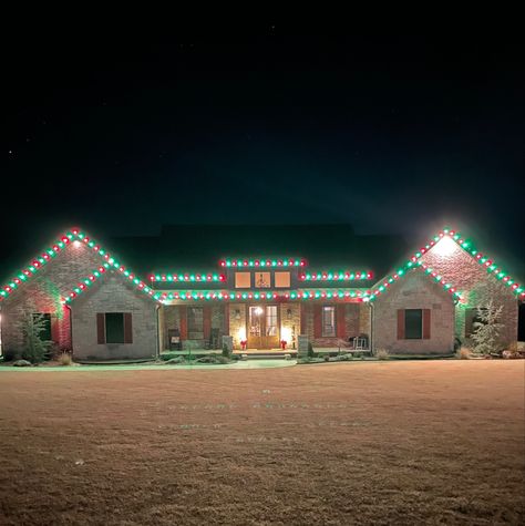 This beautiful home decorated for Christmas is from the custom build Ragsdale Project in Claremore, OK by Kennedy Homes. Check out the gallery to see more photos of this project. House Decorated For Christmas, Lights Outside, Christmas Lights Outside, Ranch Style House, Home For Christmas, Ranch Style Homes, Ranch Style Home, Christmas Decorations For The Home, Holiday Decorating