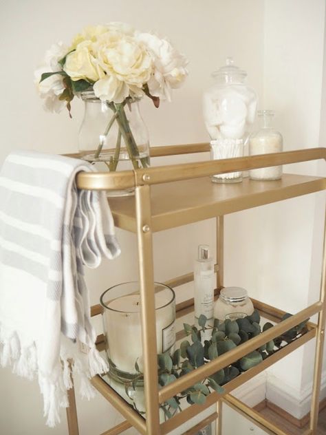 Six different ways to style a bar cart in your home Gold Bar Cart Decor Ideas, Small Bathroom Storage Solutions Bar Carts, Gold Storage Cart, Gold Bathroom Storage Cart, Ikea Bedside, Bedside Table Ikea, Gold Bar Cart Target, Hotel Chic, Drinks Trolley