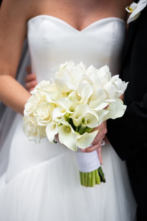 Classic wedding bouquet of white calla lilies, garden roses, and tulips designed by Edge Design Group White Roses And Calla Lily Bouquet, Calla Lilly And Rose Bouquet, Calla Wedding Bouquet, Calla Lily Rose Bouquet, Calilily Flower Wedding Bouquet, Calalillies Wedding Bouquet, Rose Calla Lily Bouquet, Rose And Calla Lily Bouquet, Calla Lily Bridesmaid Bouquet