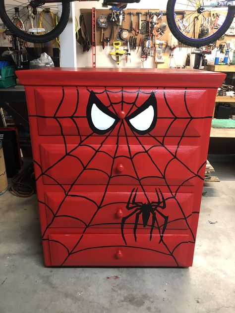 Spiderman And Batman Bedroom, Spiderman Nightstand, Spiderman Dresser Diy, Disney Themed Furniture, Spider Man Dresser Diy, Spiderman Drawer, Spiderman House Decor, Spidey Room Ideas, Spiderman Room Decor Ideas