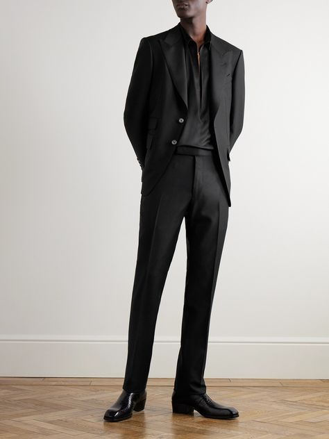 These refined suit trousers are tailored on TOM FORD's signature 'Shelton' block. Cut slim from wool and mohair-blend, they have adjustable waist tabs for a comfortable fit and unfinished hems to customise the break. Wear them with a sleek blazer and rollneck for a sophisticated evening outfit. Men Formal Wear Classy, Formal Cocktail Attire Men, Black On Black Suit Men, Black Formal Outfit Men, Black Trousers Outfit Men, Black Formal Dress Men, Black Male Suit, Suit Trousers Men, Celine Menswear