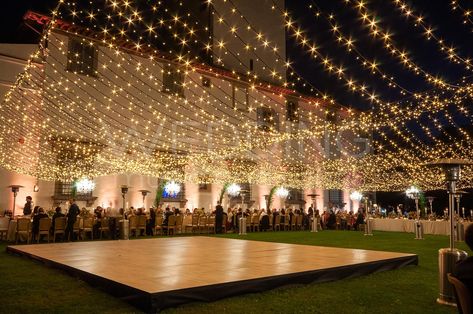 Fairy Lights Wedding Dance Floor, Sangeet Fairy Light Decor, Wedding Dance Floor Fairy Lights, Fairy Lights Entrance Decor Wedding, Outdoor Wedding Dance Floor Lighting, Fairy Light Dance Floor Wedding, Fairy Lights Over Dance Floor Wedding, Lights Over Dance Floor Wedding, Dance Floor Backdrop