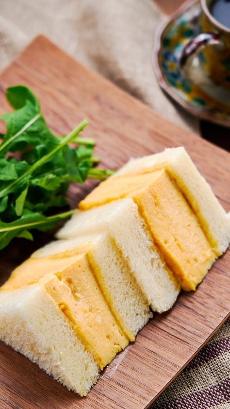 This Kyoto style Dashimaki Tamago Sando stuffs a tender, fluffy Japanese omelette between two thick slices of shokupan (Japanese sandwich bread) to make for a delightfully flavorful and satisfying egg sandwich. Japanese Egg Omelette, Japanese Egg Sandwich Recipe, Dashimaki Tamago, Best Egg Sandwich, Handheld Recipes, Japanese Sandwiches, Japanese Egg Sandwich, Asian Potluck, Tamago Sando