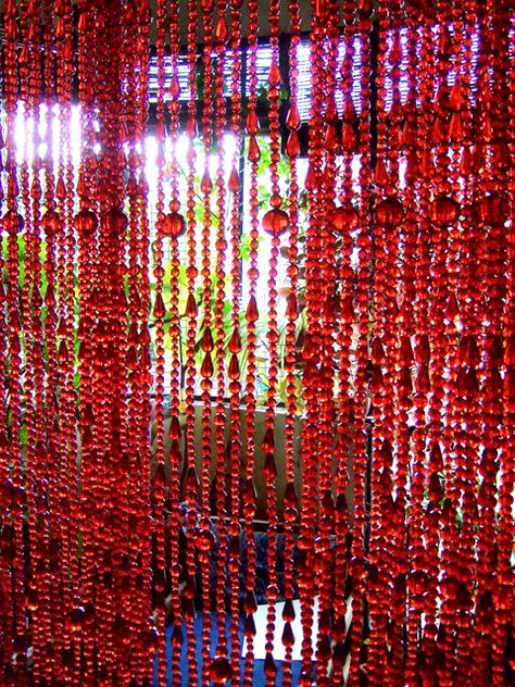 Beautiful beaded installations for room dividers, room partitions,  hotel & hospitality interiors, home decor.   The beautiful Red Crystal Bead Curtain Room Divider by Memories of a Butterfly was created for a residence in new Your USA. Memories of a Butterfly Bead Curtains are separators for doorways, residential home decor living and dining spaces. Our room dividers separate spaces in commercial and hospitality interiors. Room dividers made of beads Room Seperation Designs, Room Divider Beads, Crystal Beaded Curtains Doorway, Red Lace Curtains, Beaded Room Divider, Beaded Curtains Aesthetic, Red And Black Living Room Decor, Pearls Curtains, Red Rooms Bedroom