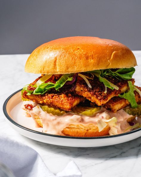 Welcome to the tofu sandwich of your dreams! This incredible vegan sandwich stars crispy breaded tofu, tangy Russian dressing, and crunchy pickles that create a flavor explosion everyone will love. #tofu #tofusandwich #tofurecipe #easytofu #tofusandwichrecipe #plantbased #vegan #veganrecipe #vegandinner #plantbased #plantbaseddinner Tofu Broccoli Stir Fry, Crunchy Pickles, Plantbased Dinner, Breaded Tofu, Tofu Sandwich, Vegan Sandwiches, Russian Dressing, Tilapia Recipes, Best Gluten Free Recipes