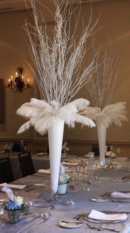 But we would do White Branches , Red Feathers, w/ blue accents Masquerade Centerpieces, Ostrich Feather Centerpieces, Feather Centerpieces, Entrance Table, Feather Decor, Feather Crafts, Centerpiece Ideas, Diy Centerpieces, Tall Vases