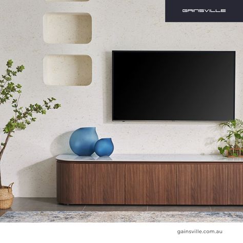 Transform your space with the Ava TV Unit: crafted in stunning American Walnut and soon in sleek Black Oak. Enjoy peace of mind with a 5-year warranty. Designed and made with excellence by Gainsville. Order now before they're gone! #Explore #InteriorDesign #Furniture #Design #FurnitureAustralia #InteriorInspo #LuxuryLiving #HomeDecor #HomeDesign #Shop #Order Chevron Bedroom, Ruang Tv, Stone Benchtop, Curved Tvs, Chevron Mirror, Modern Tv Units, Chevron Rugs, Feature Chair, Tv Units