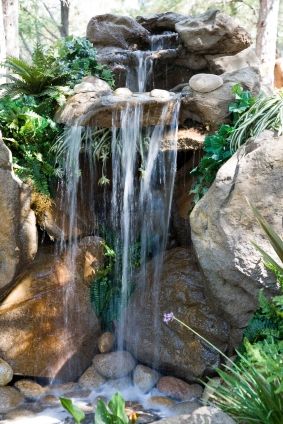 **How to Build a Backyard Pond Waterfall** Tip: Keep your pond filter pump separate from your waterfall pump to give yourself the option of turning off the waterfall at night or over winter. The difference in electricity usage will save you money. Garden Concept, Kolam Koi, Taman Air, Backyard Gardens, Living Garden, Air Mancur, Outdoor Water Features, Gardens Ideas, Garden Waterfall