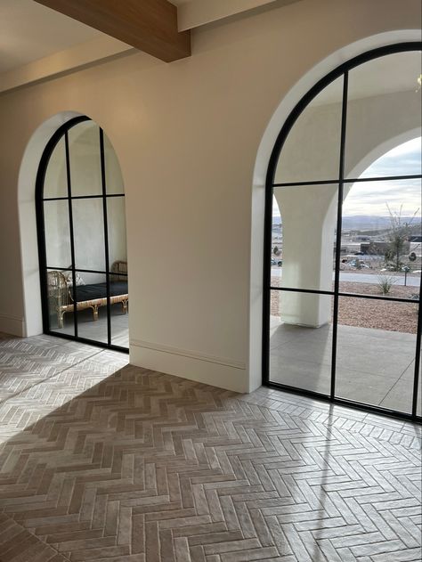 4 Arched windows in Dining Room on East wall. Big Arch Window Living Rooms, Arch Door With Curtain, Arched Black Windows, Arched Exterior Doors Entrance, Modern Arch Window, Black Arch Window, Modern Arched Windows, Arched Breezeway, Arch Ways In Home