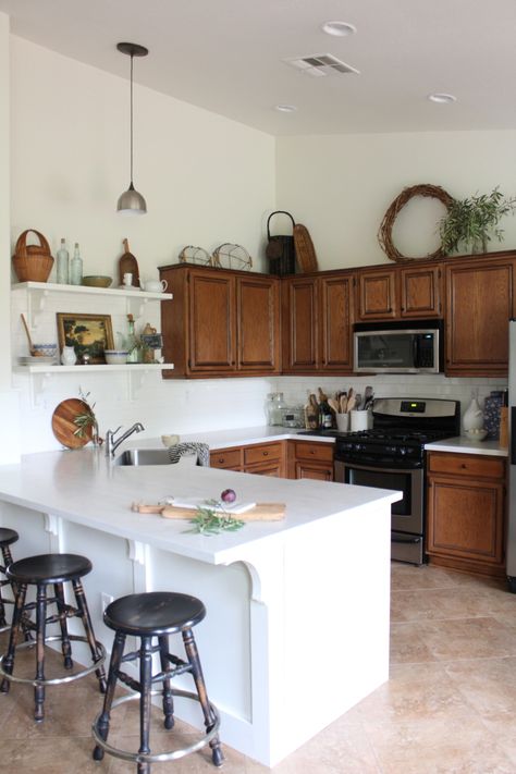 4 Inexpensive Ways to Update a Tired Kitchen - Contributed by Zillow - Honey N Hydrangea Kitchen Cabinet Decorations, Above Kitchen Cabinet, Decorating Above Cabinets, Above Cabinet Decor, Kitchen Cabinet Decor, Thrifty Style, Open Kitchen Cabinets, Creative Backsplash, L Kitchen