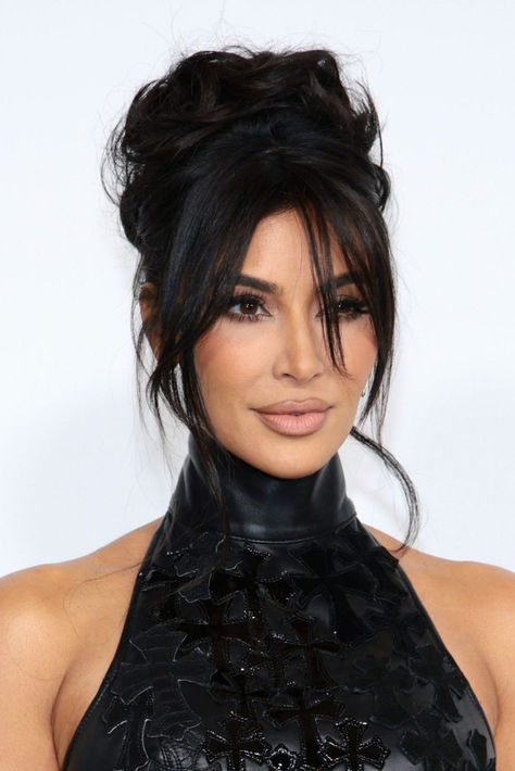 Kim Kardashian attended the 2023 CFDA Fashion Awards wearing a black Chrome Hearts gown. Kendall Jenner Kourtney Wedding Hair, Kim K Pamela Hair, Kim Updo Hairstyles, Messy Bun Kim Kardashian, Updo With Tendrils, Kim Kardashian Hairstyles 2023, Kim Kardashian Up Do Hairstyles, Kim Kardashian Bangs Fringes 2023, Kim Kardashian Upstyles