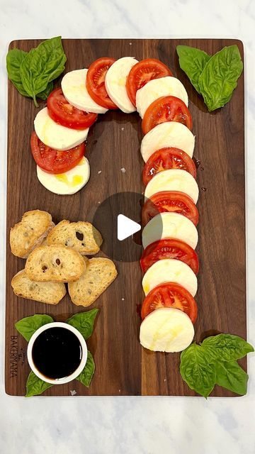 Maegan Brown ~ The BakerMama on Instagram: "❤️🤍 Candy Cane Caprese Board ❤️🤍 a simple and stunning way to serve an appetizer during the holidays! 🎄🍅🧀 It only requires a few ingredients and comes together in a matter of minutes so you can spend more time with your loved ones this holiday season. 

Comment “recipe” and I’ll DM you the link! or tap the link in profile @thebakermama for all the board building details. Follow for more festive recipes and ENJOY! ❤️ #TheBakerMama #BoardsByTheBakerMama

https://thebakermama.com/recipes/caprese-candy-cane-board/

#caprese #candycanecaprese #candycane #christmasappetizer #holidayappetizer #cheeseboard #cheeseplatter #christmascaprese #christmas #christmasfood #christmasrecipe #christmasideas #merrychristmas #candycane #christmassnacks" Candy Cane Caprese Board, Caprese Candy Cane, Caprese Board, Xmas Appetizers, Christmas Finger Foods, Party Food Bars, Building Details, Xmas Desserts, Festive Recipes