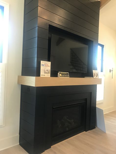 Light Wood Mantle, Black Shiplap Fireplace, Black Shiplap, Faux Wall, Faux Walls, Wood Mantle, Fireplace Tile Surround, Black Fireplace, Shiplap Fireplace