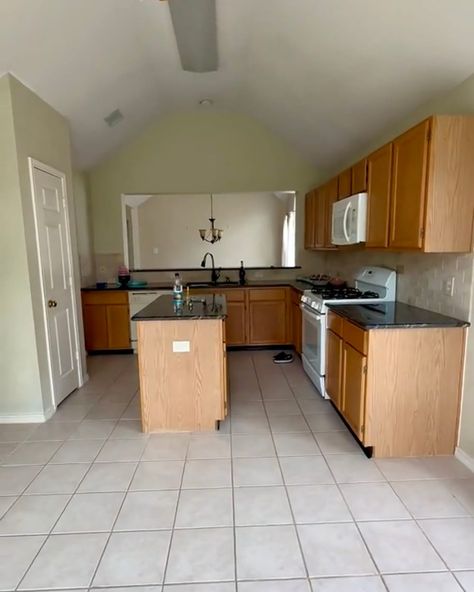 Empty kitchen before renovation. Bright Green Cabinets, Painted Oak Cabinets, Empty Kitchen, Vintage Outdoor Decor, Ikea Dining Table, Empty House, Painting Oak Cabinets, White Tile Floor, Cabinet Paint Colors