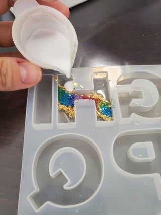 UV Resin Rainbow Keychain : 5 Steps (with Pictures) - Instructables Uv Resin Letter Keychain, Resin Keyrings Ideas, Rainbow Resin Keychain, Uv Resin Molds, Resin Charms Diy, Uv Resin Keychain Ideas, Uv Resin Keychain Diy, Epoxy Keychain Ideas, Resin Letter Keychain Ideas