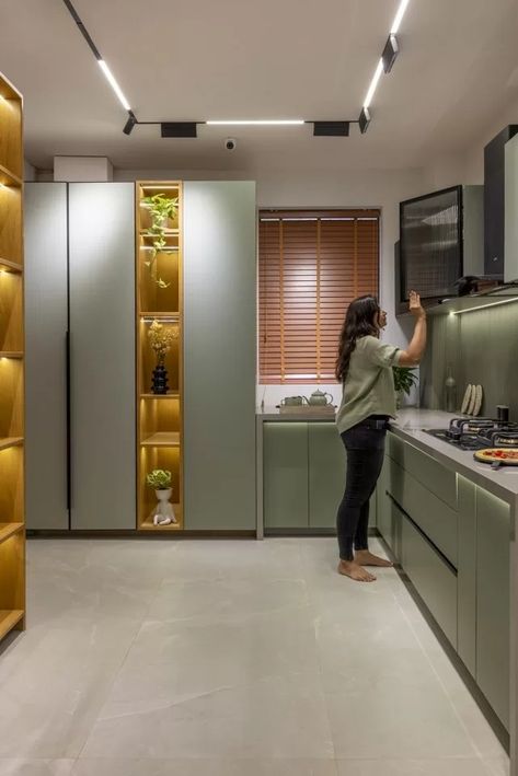 Kitchen Showcase Design with a Twist of Wardrobe Display | J Architects - The Architects Diary Kitchen Showcase, Hardware Display, 2024 Living Room, Living Room Designs India, Wardrobe Display, Kitchen Cabinetry Design, Kitchen Designer, Modern Kitchen Cabinet Design, House Design Pictures