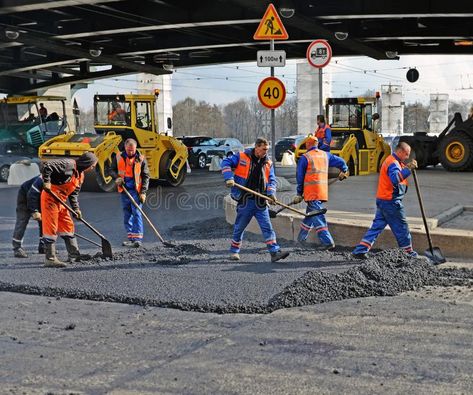 Repair of the road. The team of workers stacks new asphalt on the carriageway of , #ad, #asphalt, #stacks, #city, #carriageway, #road #ad Road Workers, Street Image, St Petersburg Russia, Petersburg Russia, City Street, Business People, The Team, St Petersburg, Division