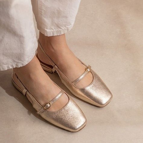 • GOLD • Step up your style game with our BERTILLE flat Mary Janes in dazzling gold by @maisontoufet! ✨ ⁠ ⁠ Designed in France and handcrafted in Portugal, these beauties are all about timeless glam and that sense of Parisian chic. And guess what? Mary Janes are totally trending right now! ⁠ ⁠ Perfect for adding some sparkle to any look, these babies will have you shining from day to night.⁠ ⁠ Ready to dip your toe in? Over half our stock has already SOLD OUT so don't wait around to get your ... Flat Mary Janes, Mary Jane Flats, Parisian Chic, Step Up, Mary Janes, Dip, Right Now, Portugal, Sense