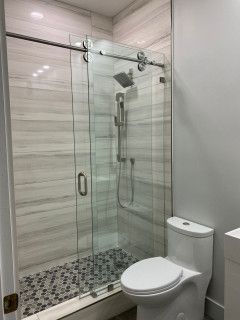 75 Small Sliding Shower Door Ideas You'll Love - August, 2023 | Houzz Sliding Shower Door Ideas, Shower Door Ideas, Guest Bath Remodel, Bathroom Ideas For Small Spaces, Condo Makeover, Half Wall Shower, Glass Shower Wall, Tile Walk In Shower, Tub To Shower Remodel