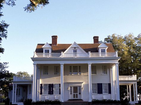 The Notebook: Probably the most romantic home renovation ever captured on film. Of course we're talking about the house with the blue shutters and the wraparound porch—the historic home that Noah (Ryan Gosling) remodels in an effort to win back his love, Allie (Rachel McAdams). The Notebook House, White House With Black Shutters, House With Black Shutters, Notebook House, Black Shutters, Blue Shutters, Plans Architecture, Plans House, Casa Vintage