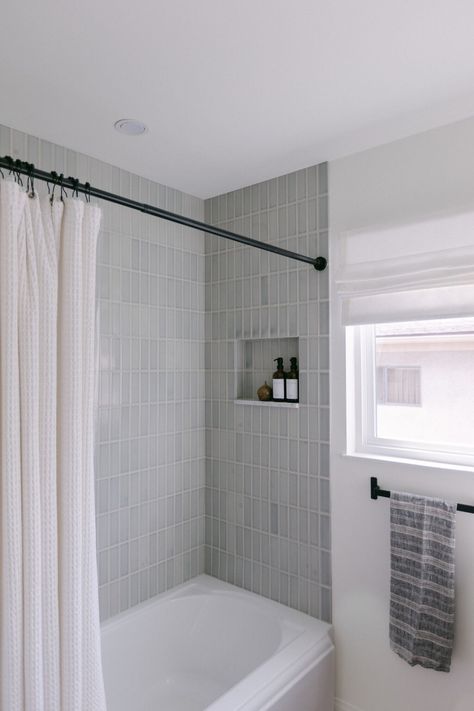 Picket Tile Bathtub Surround, Timeless Subway Tile Bathroom, Bathtub And Tile Ideas, Small Main Floor Bathroom, Tile Bathroom Walls With Tub, Aloe Matte Ceramic Tile, Bathroom Shower Tile With Tub, Guest Bathroom Tub Shower Combo, Light Gray Shower Tile