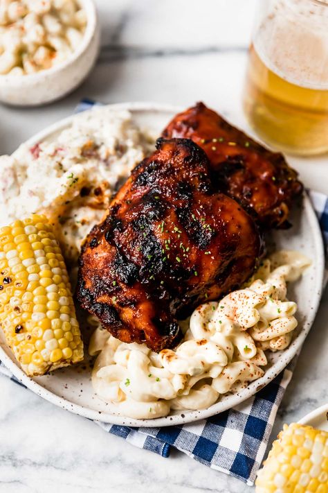 Say hello to your newest go-to summer staple, the best Grilled BBQ Chicken recipe! Barbecue chicken is totally classic but surprisingly difficult to do the right way. This easy recipe utilizes a quick BBQ chicken marinade, a flavorful BBQ chicken dry rub, & indirect grilling, yielding perfectly tender, juicy, & flavorful BBQ chicken every time. The only grilled barbecue chicken recipe you'll need from now on! #bbqchicken #grilledbbqchicken #grilledchicken #grilledchickenrecipes #barbecuechicken Bbq Grilled Chicken Recipes, Bbq Chicken Marinade, Summer Dinner Recipes Grill, Poulet Tikka Masala, Chicken Seasoning Recipes, Best Bbq Chicken, Bbq Chicken Recipe, Barbecue Chicken Recipe, Buffalo Chicken Wraps