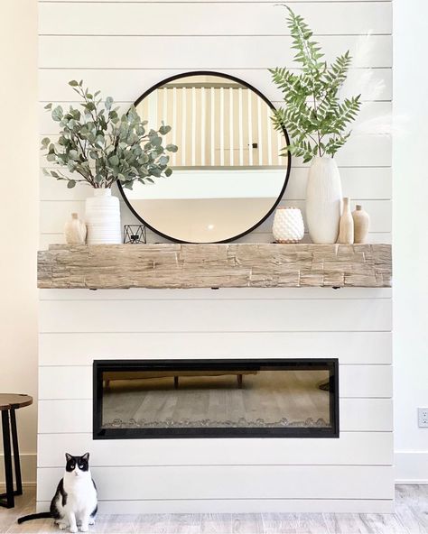 A House We Built on Instagram: “On our fireplace mantel, I mixed white and wood vases with faux greenery for summer. My favorite round black mirror has been the one…” Round Mirror Over Mantle, Mantle Piece Ideas, Mantle Decorating Ideas With Mirror, Fire Mantle, A House We Built, Mirror Over Fireplace, Farmhouse Fireplace Mantels, Mantle Decorations, Mantle Ideas