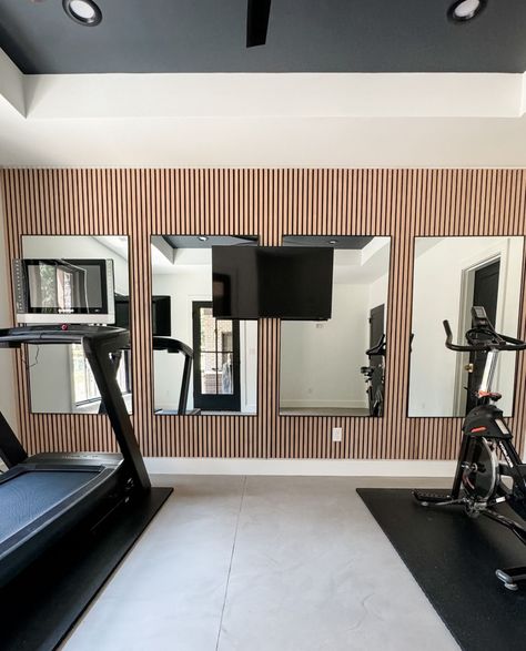 Workout Room Tv, Mini Fridge In Home Gym, Classy Home Gym, Unfinished Basement Workout Space, Basement Fitness Room Ideas, Gym In Garage Ideas, Basement Sports Room, Living Room Gym Combo, Gym Interior Design Ideas Modern Luxury