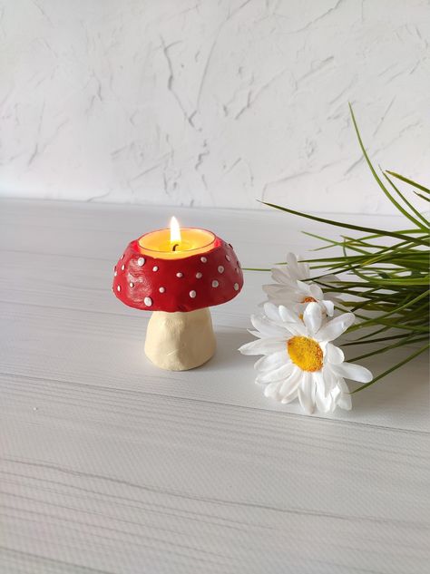 Create a mesmerizing ambiance with this DIY candle decor project, as the warm glow and subtle flicker of candlelight transform any space into a cozy and inviting retreat. Stick Decor, Clay Candle Holders, Mushroom Tea, Clay Candle, Amanita Muscaria, Diy Air Dry Clay, Air Dry Clay Projects, ดินปั้น Polymer Clay, Clay Diy Projects