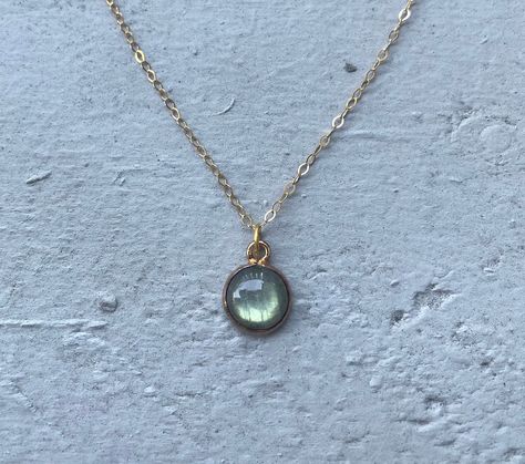 This necklace is handmade with a genuine 8mm round labradorite stone and a 14k gold-filled chain.  This necklace is hypoallergenic. (Cadium free, lead free, and nickel safe) Labradorite is a protective stone that strengthens intuition.  The necklace comes in a hand-wrapped gift box, ready to be gifted. If you would like to leave a note, you can do so during checkout. Please note that every stone is unique and varies in color. Labradorite Necklace, Crystal Necklaces, Labradorite Jewelry, Labradorite Necklaces, Frye Boots, Labradorite Stone, Cute Jewelry, Crystal Necklace, Labradorite