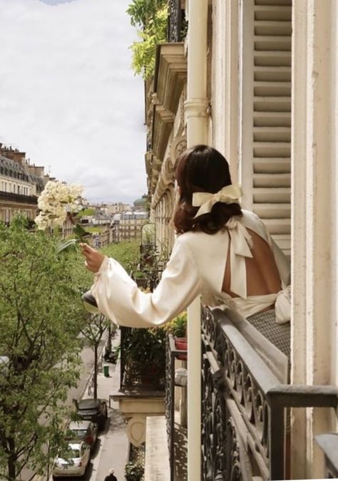 7 Chic Ways To Dress Like a French Women. How to style your clothing to achieve the classic Parisian chic look #frenchstyle #stlye #fashion #street #inspiration #blogger The Window, Balcony, A Woman, Paris, Flowers