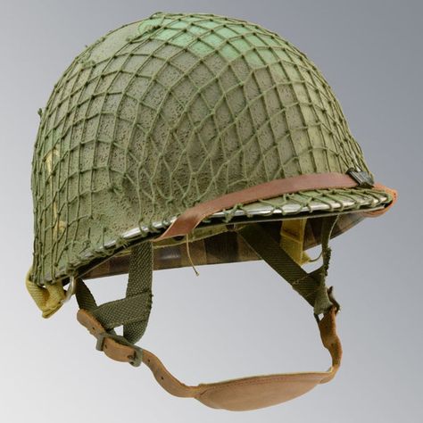 Restored original aged US WWII era M1 helmets for historical re-enactment impressions, displays and private collections. Visit Top Pots for museum quality WWII US Army M1 helmets, liners and accessories.  Every helmet now made with webbing made on the only original WWII era shuttle looms still in existence! Marine Corps Uniforms, M1 Helmet, Us Army Infantry, Us Army Uniforms, Navy Emblem, Combat Helmet, Japanese Uniform, Army Helmet, British Army Uniform