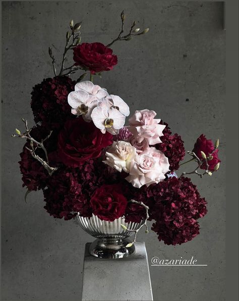 Emo Wedding Bouquet, Dark And Moody Flowers, Dark And Moody Wedding Florals, Dark Pink Flower Arrangements, Dark Academia Floral Arrangements, Red And Purple Table Decorations, Dark Moody Flowers, Dark Romantic Wedding Flowers, Burgundy Wedding Aesthetic