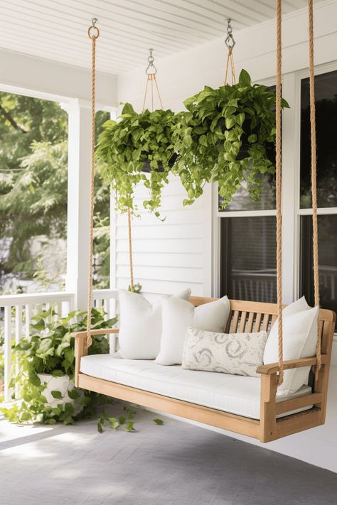 45 Front Porch Ideas That Will Bring You Together Porch Hanging Chairs, Aesthetic Porch Ideas, Porch Around House, Porch Swings Hanging Ideas, Front Porch Furniture Layout Ideas, Front Porch Sitting Ideas, Front Patio Decorating Ideas, Porch Swings Hanging, Front Porch Furniture Layout