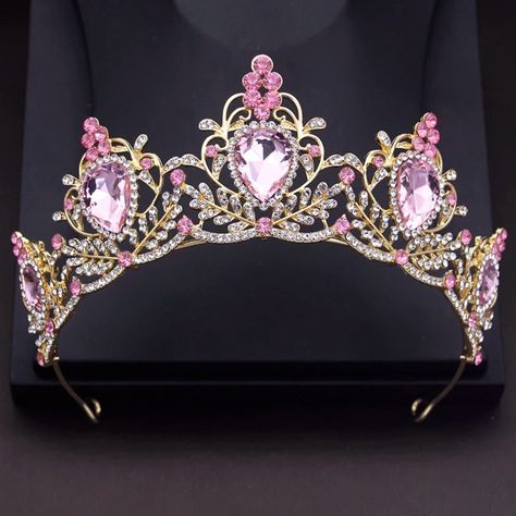 Embrace the essence of romance and elegance with our Pink Princess Tiara. Exquisitely crafted with a lustrous zinc alloy and encrusted with sparkling pink rhinestones and artificial crystals, this tiara is the perfect accessory for your fairytale wedding. The tiara's design radiates sophistication, featuring an intricate lattice of rhinestones that surround the larger pink crystals, which are set to catch the light from every angle. Its generous dimensions of 14.5cm in diameter and 6cm in height Pink Tiara Aesthetic, Regal Aesthetic, Pink Tiara, Prom Tiaras, Fantasy Crown, Fantasy Life, Modern Princess, Princess Tiara, Pink Prom