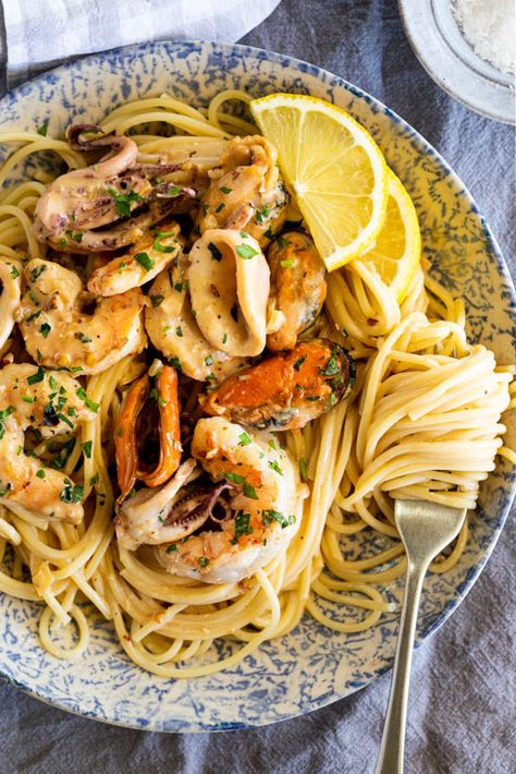 Creamy garlic seafood pasta - Simply Delicious One Pot Seafood Pasta, Pesto Seafood Pasta, Summer Seafood Pasta, Seafood Pasta White Wine Garlic Butter, Sea Food Pasta Recipes, Seafood Capellini, Mixed Seafood Dishes, Seafood Mix Pasta, Mixed Seafood Pasta